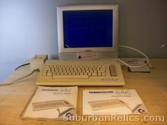 COMMODORE 64c COMPUTER - w/manuals/power supply etc. tested good