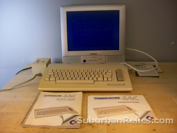 COMMODORE 64c COMPUTER - w/manuals/power supply etc. tested good - Click Image to Close