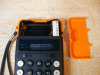 Omron model 86R - ORANGE POCKET CALCULATOR -working well, 1970's