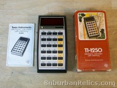 Texas Instruments TI-1250 - 70's CALCULATOR - w/box, manual good